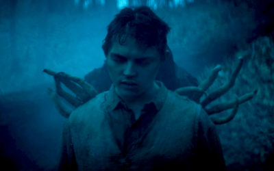 Light a candle, curse the new poster for IFC Midnight’s “THE VIGIL”