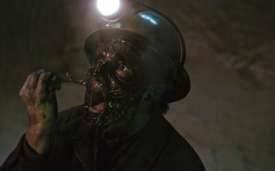 Exclusive photo, plus poster, retro-VHS slipcase and release news: “ASTONISHING TALES OF TERROR: ROCKTAPUSSY”